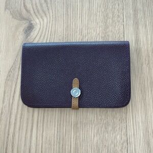 Purple leather clutch